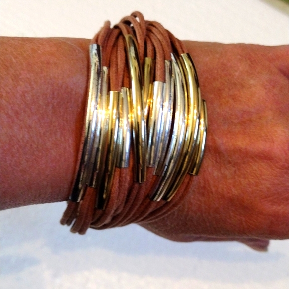 Beautiful multiple strands of twine faux gold and silver bracelet. - Picture 1 of 9